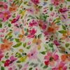 Tissu viscose motifs fleurs multicolore - écru x 10 cm