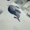 Tissu piqué de coton nid d'abeille baleines - blanc x 10 cm