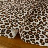 Tissu jersey sweat french terry léopard - écru x 10 cm
