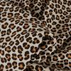 Tissu jersey sweat french terry léopard - écru x 10 cm