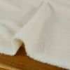 Tissu fausse fourrure à paillettes - écru x 10 cm