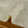 Tissu jacquard viscose léopard - écru x 10 cm