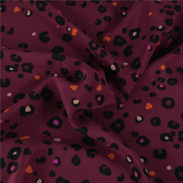 Tissu crêpe de chine soie léopard haute couture - bordeaux x 10 cm