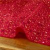 Tissu popeline de coton étincelles Noël - rouge x 10 cm