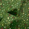 Tissu popeline de coton étincelles Noël - vert x 10 cm