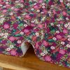 Tissu popeline de coton fleurs de Noël - violet x 10 cm