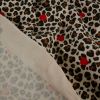Tissu jersey fin léopard coeurs - écru x 10 cm
