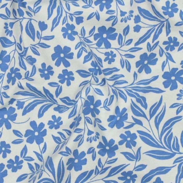 Tissu jersey fin fleurs bleues - blanc cassé x 10 cm