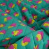 Tissu double gaze matelassée réversible fleurs léopard - vert fuchsia x 10 cm