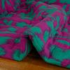 Tissu double gaze matelassée réversible fleurs léopard - vert fuchsia x 10 cm