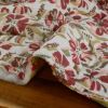 Tissu double gaze matelassée réversible fleurs léopard - blanc vert x 10 cm