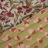 Tissu double gaze matelassée réversible fleurs léopard - blanc vert x 10 cm