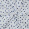 Tissu double gaze plumetis fleurs bleues - blanc x 10 cm
