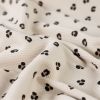 Tissu jersey côtelé léopard - beige x 10 cm