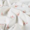 Tissu jersey côtelé fleurs romantiques - blanc cassé x 10 cm