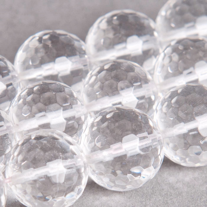 Cristal de roche : perle ronde à facettes 8mm cristal x2