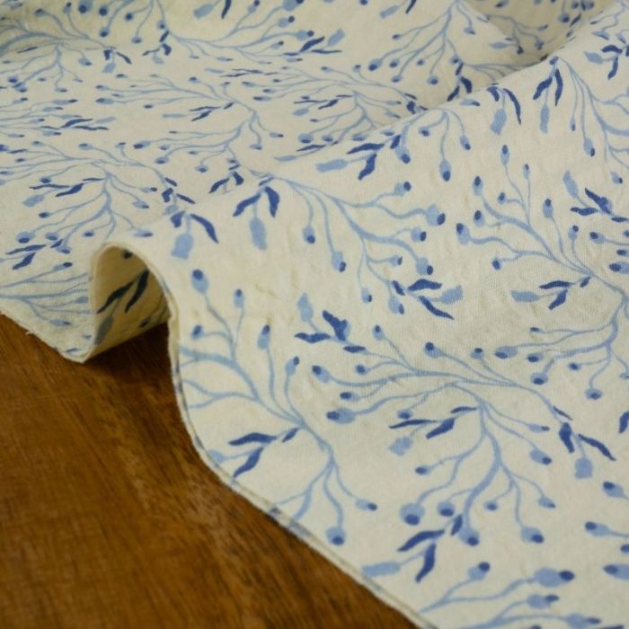 Tissu seersucker fleurs vivaces - bleu x 10 cm