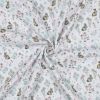 Tissu double gaze lapins et fleurs - blanc x 10 cm