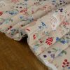 Tissu matelassé réversible animaux et fleurs - beige x 10 cm