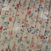 Tissu matelassé réversible animaux et fleurs - beige x 10 cm