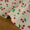 Tissu demi-natté canvas motifs cerises - beige x 10 cm