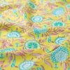 Tissu voile coton fleurs indiennes - jaune x 10 cm