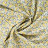 Tissu voile coton motifs citrons - écru x 10 cm