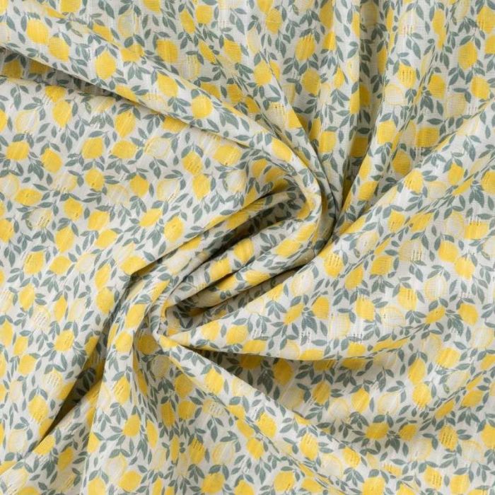 Tissu voile coton motifs citrons - écru x 10 cm