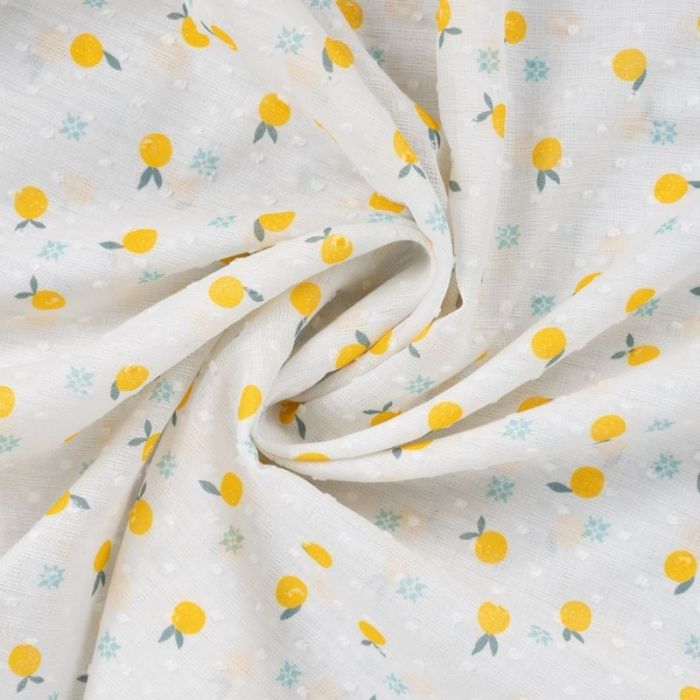 Tissu coton plumetis citrons - écru x 10 cm