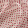 Tissu coton enduit coeurs rouges - rose clair x 10 cm
