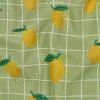Tissu coton enduit citrons carreaux - vert clair x 10 cm