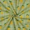 Tissu coton enduit citrons carreaux - vert clair x 10 cm