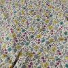 Tissu batiste coton fleurs - vert x 10 cm