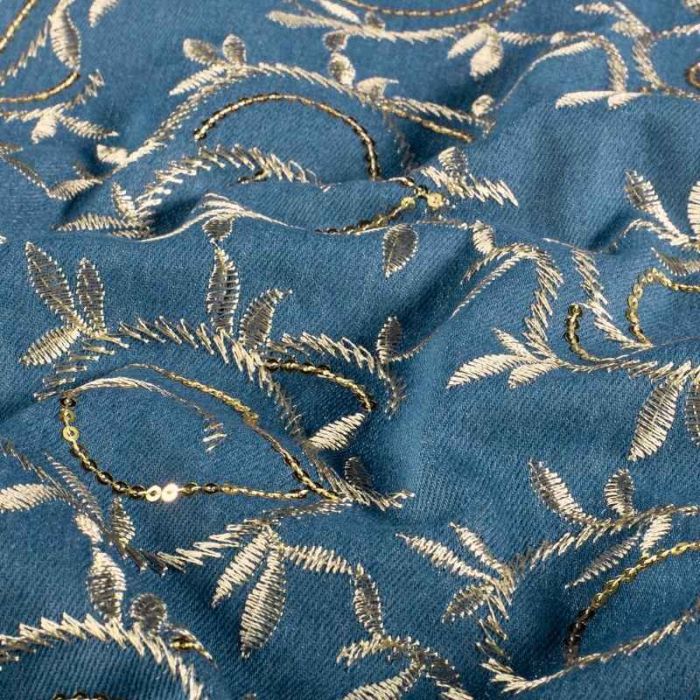 Tissu chambray denim stretch feuillages brodés - bleu x 10 cm