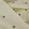 Tissu fausse fourrure Teddy fleurs brodées - écru x 10 cm
