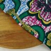 Tissu popeline coton Wax hibiscus - vert et doré x 10 cm